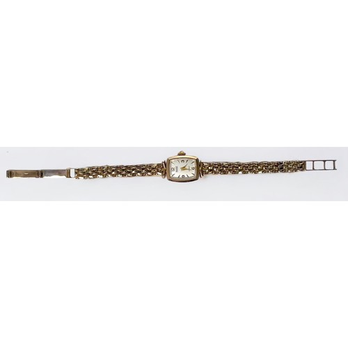 142 - A ladies 9ct gold Bernex wristwatch, the silvered dial with batons denoting hours and Arabic numeral... 