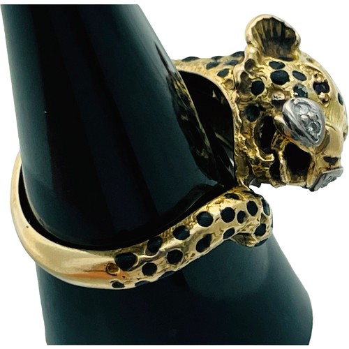 185 - An 18ct yellow unmarked gold (tested) dress ring, cast as a stylised  leopard, with black enamel spo... 