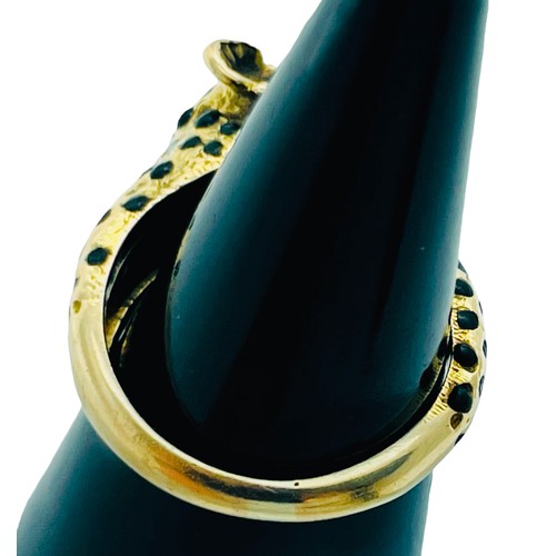 185 - An 18ct yellow unmarked gold (tested) dress ring, cast as a stylised  leopard, with black enamel spo... 