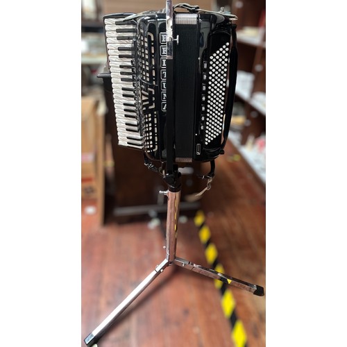 306 - A Beltuna Prestige IV piano accordion, with pearlised keys, 41 treble keys, 9 treble stops and 120 b... 