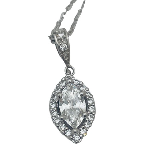 210 - A platinum and diamond halo pendant, set with a marquise cut diamond to the centre, surrounded by 20... 