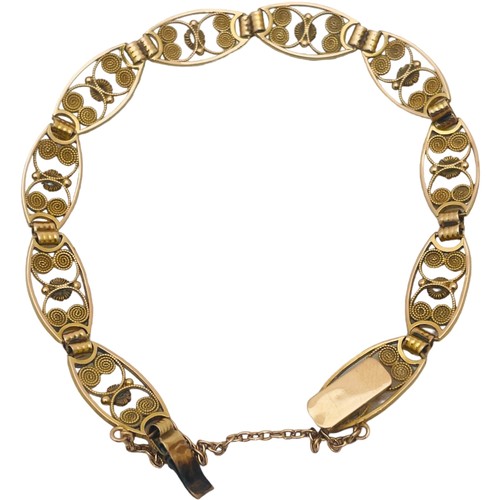 231 - A 9ct yellow gold oval open linked filigree bracelet, with safety chain, weight 11.1 grams.