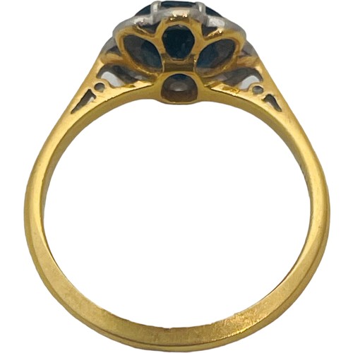 233 - An 18ct yellow gold sapphire and diamond cluster ring, weighs 2.7 grams.