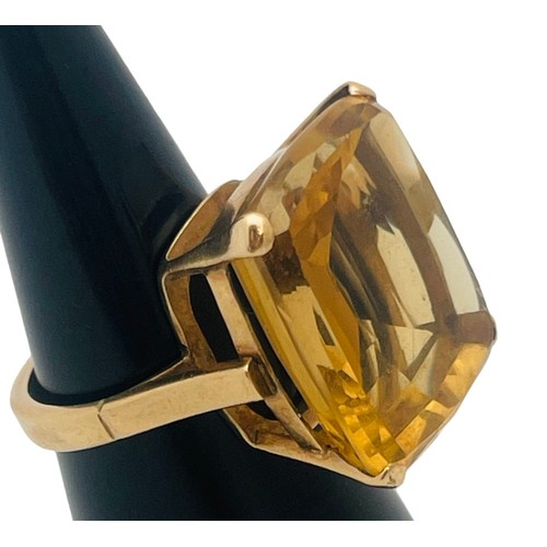 234 - A 9ct yellow gold dress ring, claw set with a large cushion cut citrine, measuring 20mm x 18mm, esti... 