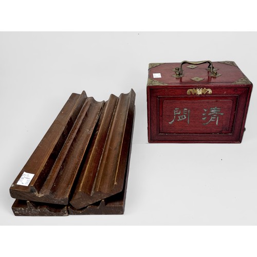 312 - A bone tile Mahjong set, housed in fitted wooden box with handles, with four wooden tile racks