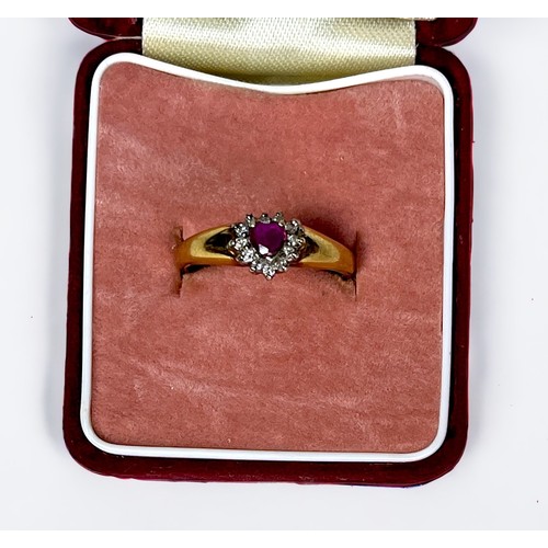 251 - A 9ct gold ruby and diamond ring, heart-shaped ruby surrounded by 12x diamonds, estimated 0.10cts, 2... 