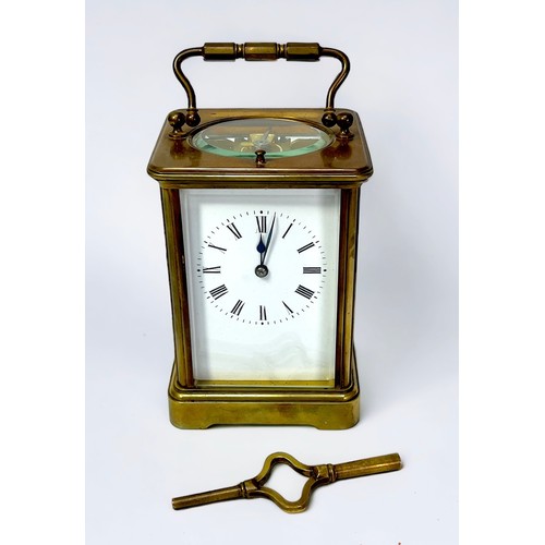 401 - A 19th century French brass repeater carriage clock, the white enamel dial with Roman numerals denot... 