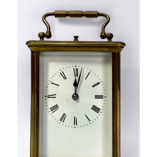 401 - A 19th century French brass repeater carriage clock, the white enamel dial with Roman numerals denot... 