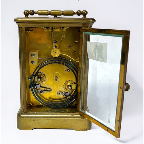 401 - A 19th century French brass repeater carriage clock, the white enamel dial with Roman numerals denot... 