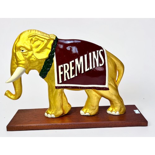 318 - An orignal Fremlin's Brewery double-sided Elephant advertising sign, gold painted with maroon and wh... 