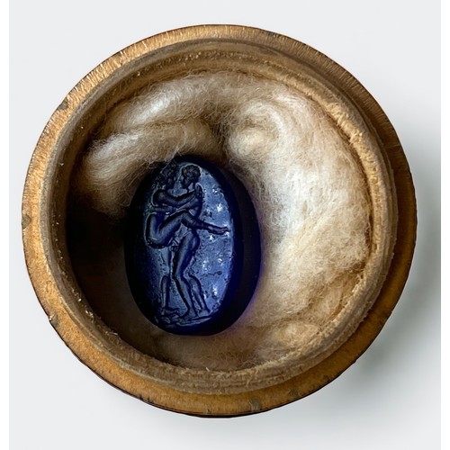 208 - A 'James Tassie' Roman style oval glass 'sapphire gem' with erotic intaglio, 16x12mm, in inscribed a... 