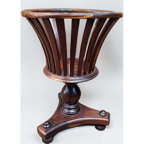 544 - A George III 'style' mahogany jardiniere stand, with circular top and curved slatted sides, raised o... 