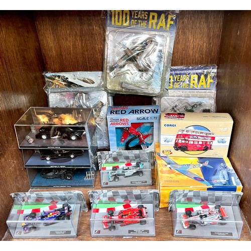 361 - A collection of assorted boxed die-cast scale model vehicles comprising, four Formula 1 model racing... 