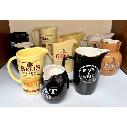 58 - Ten various ceramic whisky water jugs including Black & White, Haig, VAT 69, Dewar's etc (in section... 