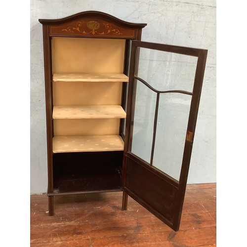 545 - An Edwardian mahogany single door display cabinet, with boxwood marquetry and stringing.