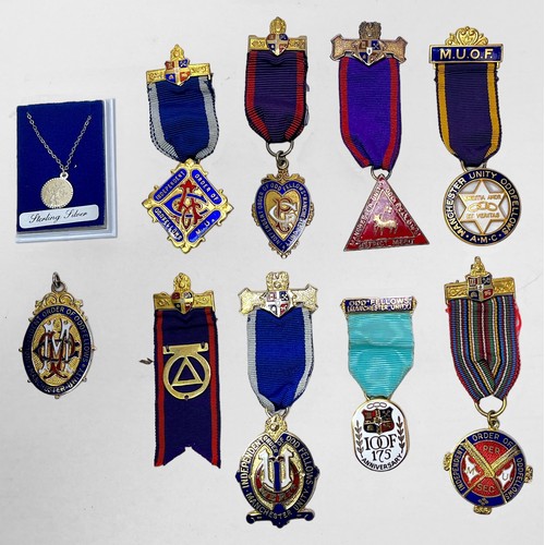 260 - Three various enamel and silver-gilt Masonic medals / jewels and ribbons comprising, Manchester Unit... 