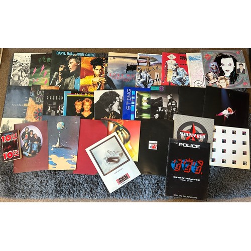 380 - A collection of twenty-four assorted concert / music tour programmes comprising British bands; 10cc ... 