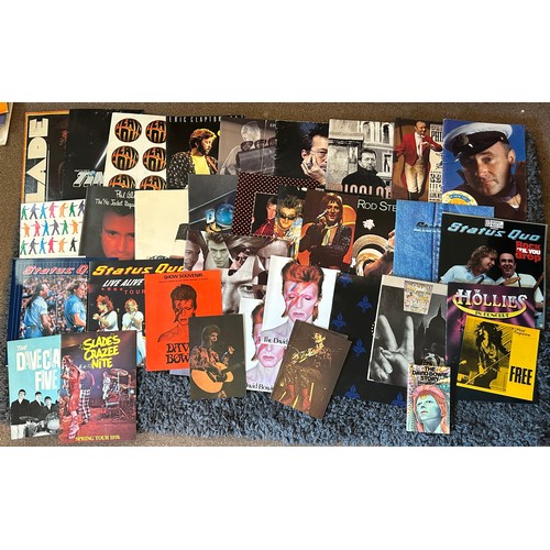 383 - A collection of twenty-seven assorted concert / music tour programmes comprising iconic British rock... 