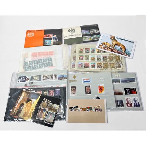 283 - A suitcase containing GB stamps, including mounted mint stamps in stock books, some mounted used, FD... 