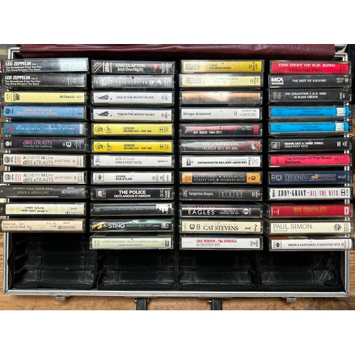 370 - A briefcase containing forty-seven assorted cassettes by various artists, to include, Led Zeppelin, ... 