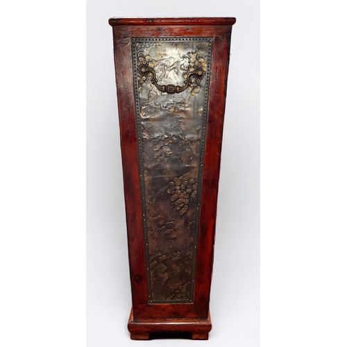 292 - An Oriental wooden umbrella stand, of squared, tapering form, with floral metal panels to each side,... 