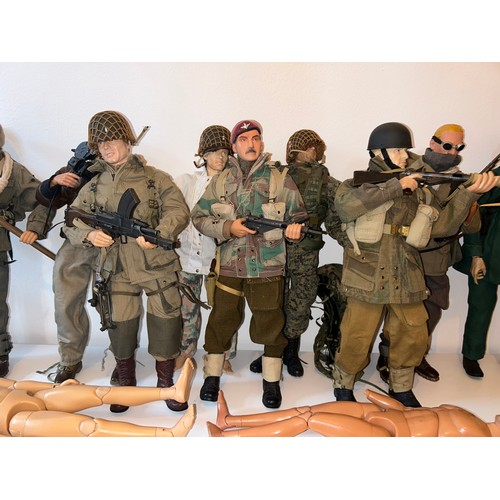 368 - A collection of nine assorted early Dragon Models 1/6 scale military action figures, modelled as var... 