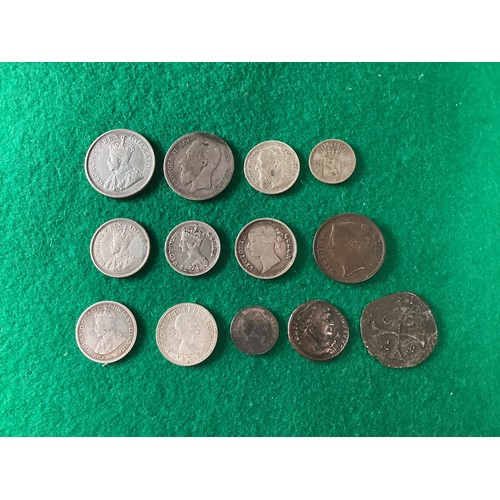 255 - A box of British and foreign coins mostly 20th century but there are some later and a number of earl... 