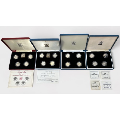 262 - Four Royal Mint cased sets of silver proof one pound coins, including a 1984 - 87 set and a 1994 - 1... 