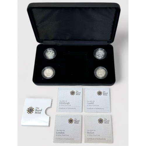 264 - A cased Royal Mint four coin set of UK silver proof £1 coins depicting the four British nation capit... 