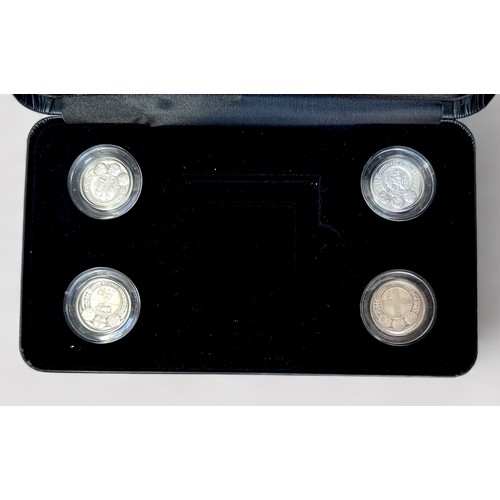 264 - A cased Royal Mint four coin set of UK silver proof £1 coins depicting the four British nation capit... 