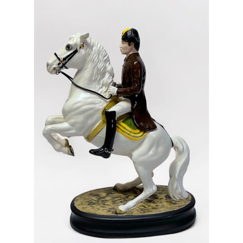 36 - A Beswick pottery Lipizzaner horse and rider ‘2467’, raised on oval base, second version, printed ma... 