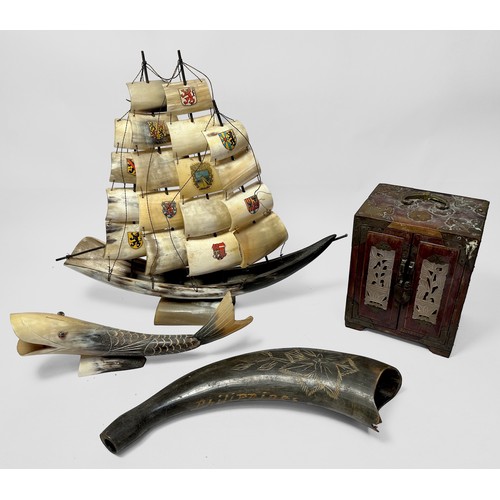 336 - A collection of assorted horn items including models of ships, fish and birds as well as some worked... 