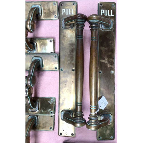 338 - Six pairs of mid 20th century brass fittings for department store doors, taken from the now-closed D... 