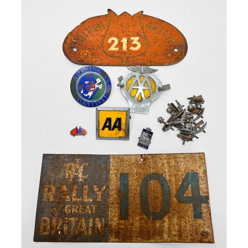 354 - A collection of motoring ephemera and car badges comprising a 1951 Rally of Great Britain rally bump... 