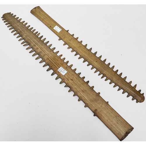 357 - WITHDRAWN: Two sawfish rostrums, largest measures 66cm long, with 58 teeth