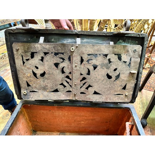 340 - A 17th century iron and iron bound strong box or 'Armada' chest of rectangular form, bound in rivete... 