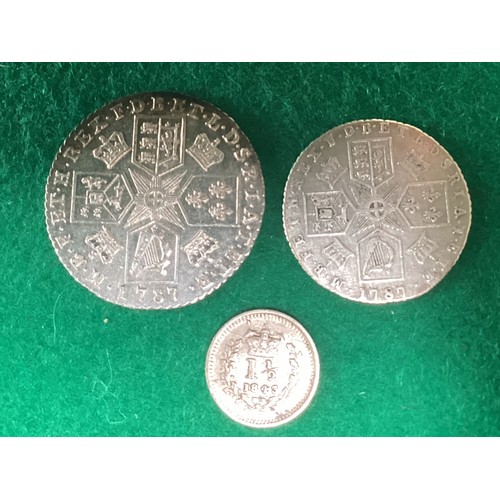 231 - Three silver coins. Two George III coins with some toning and discoloration but generally nice silve... 