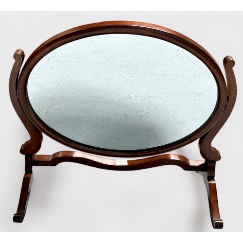 286 - A 19th century walnut toilet mirror, with platform base and pulvinated drawer, together with an oval... 