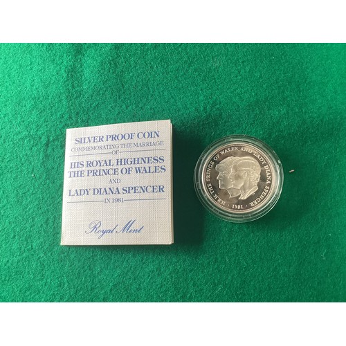 240 - Various coins including a sterling silver proof coin, weighing 28.28 grammes, to commemorate Charles... 