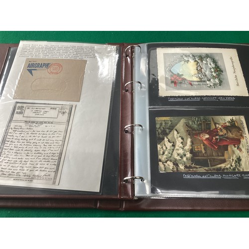 250 - An album of standard size postcards with postal history interest, including printed and real photogr... 