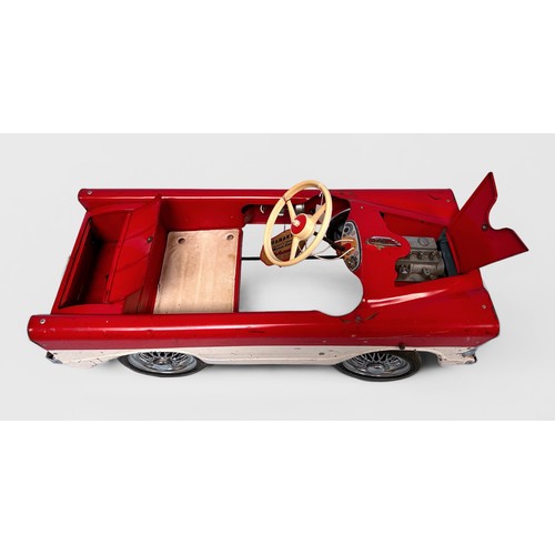 495 - A boxed 1960s Tri-ang Toys T.45 Miami children's pedal motorcar, painted red upper over white, with ... 