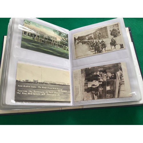 251 - An album containing 192 military cards – including art, comic, camp life, patriotic and some real ph... 