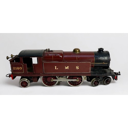 562 - An unboxed Meccano Hornby ‘O’ gauge, clockwork, LMS, 4-4-2, locomotive, no. 2180, black and burgundy... 