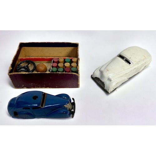 565 - A part-boxed 1930s Schuco 3000 Telesteering Car, with blue car, steering wheel, skittles, key, toget... 