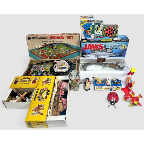 574 - A quantity of boxed vintage toys and collectables, some tin-plate, comprising two Pelham Puppets inc... 