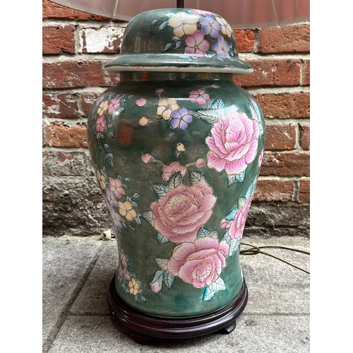 287 - A large Oriental baluster vase and cover, converted to a lamp, decorated with flowers to a green gro... 