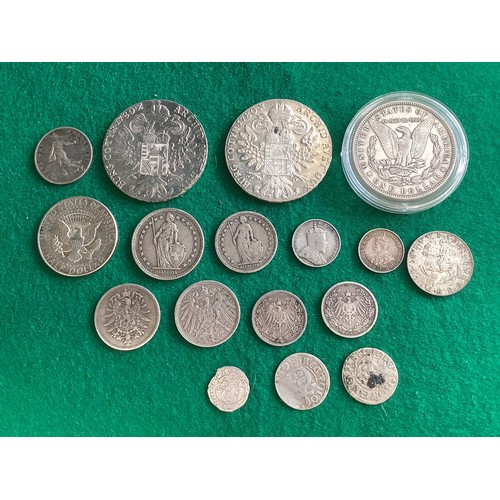 236 - Various foreign coins – most with silver content, such as two Maria Thersia thalers in about EF (one... 