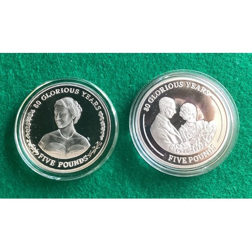 237 - Two Gibraltar cased 2006 silver proof ’80 Glorious Years’ £5 coins (which are 28.28 grams and 38.61 ... 