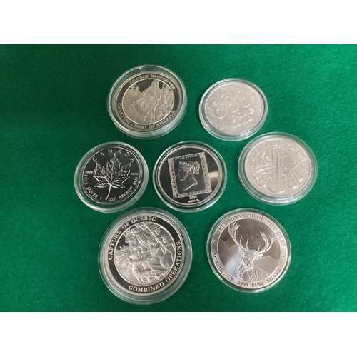 238 - This lot comprises approximately 24 pure silver limited edition coins/medallions all in plastic caps... 