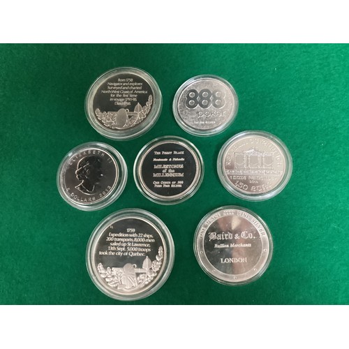 238 - This lot comprises approximately 24 pure silver limited edition coins/medallions all in plastic caps... 